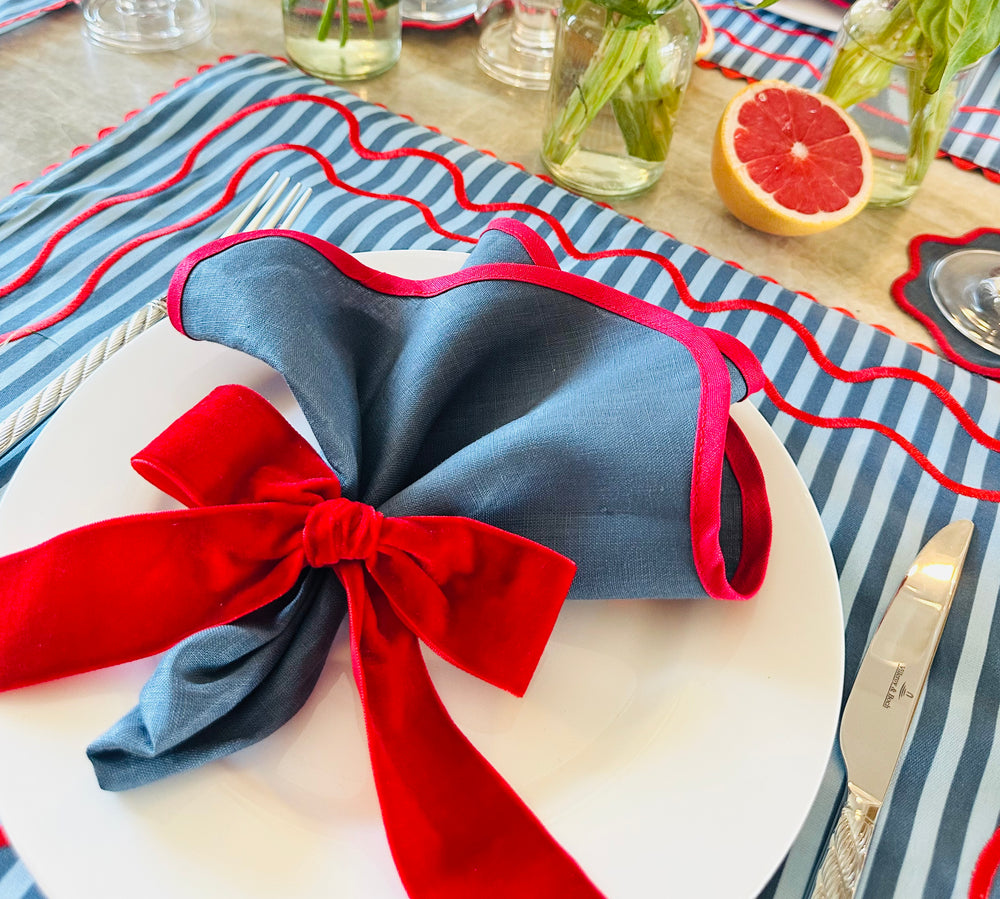 Rond de serviette noeud en velour rouge